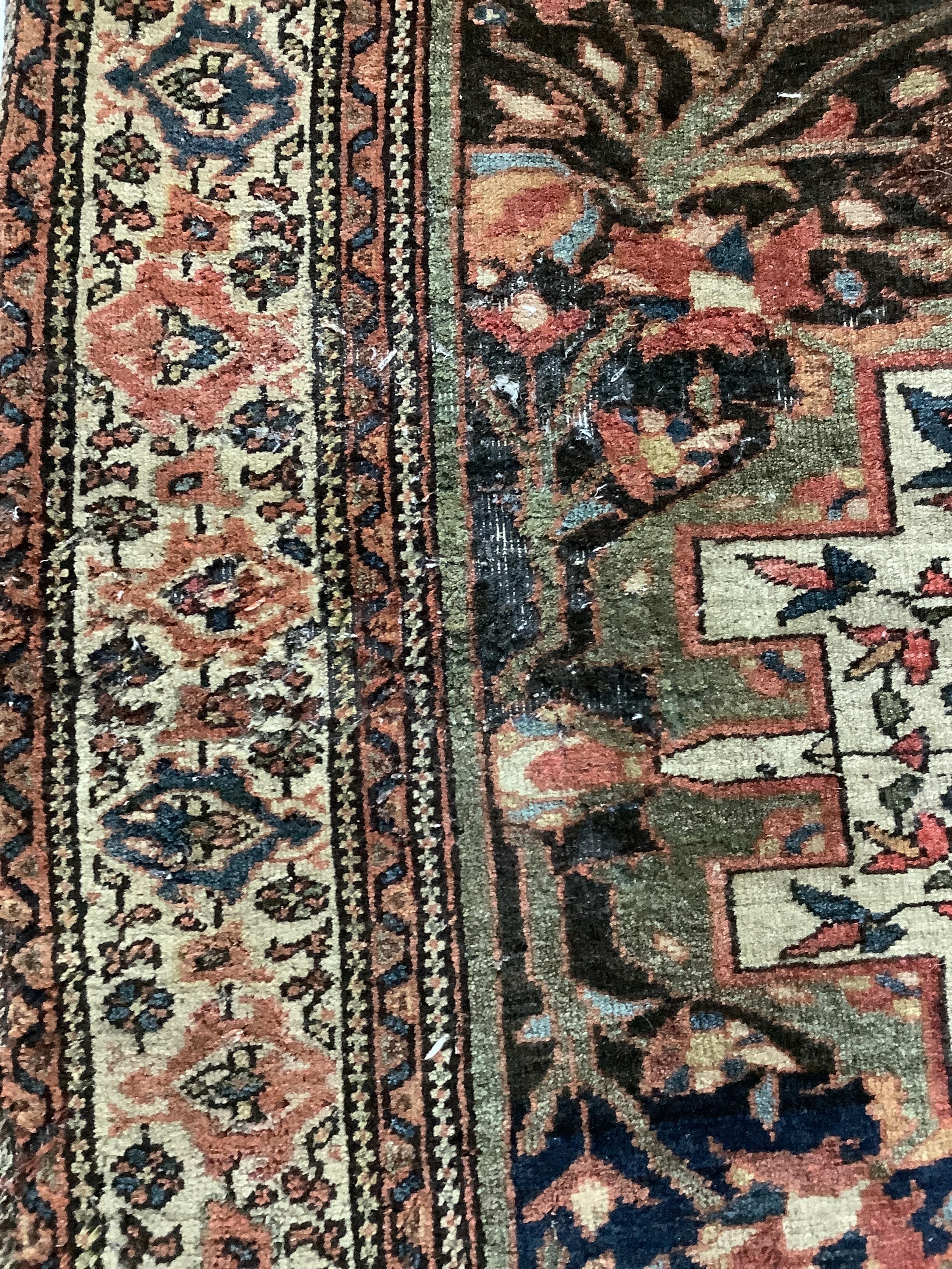 Two Tabriz blue ground rugs, larger 190 x 124cm